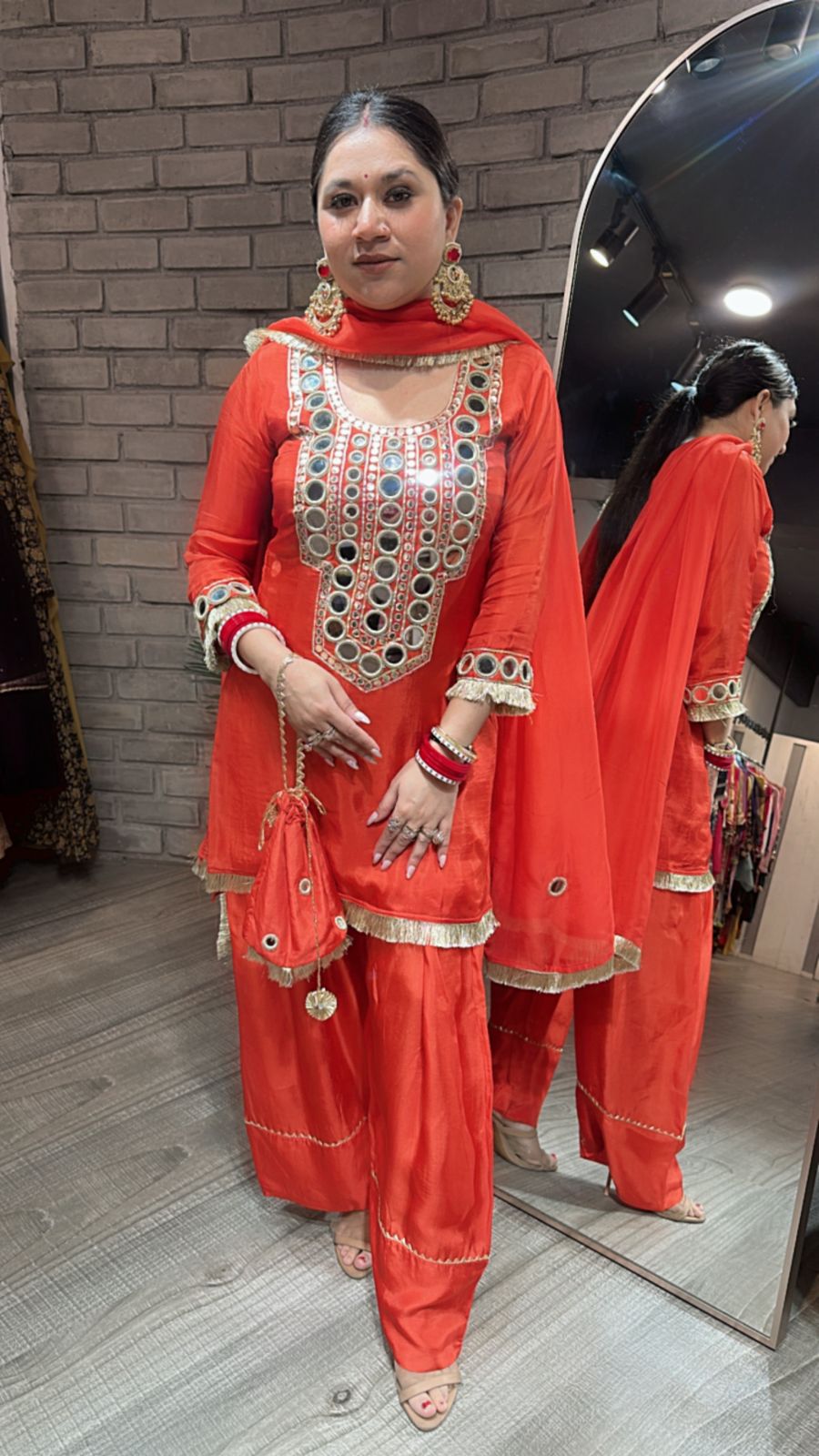 Sindhuri Rust Mirror Farshi potli Suit