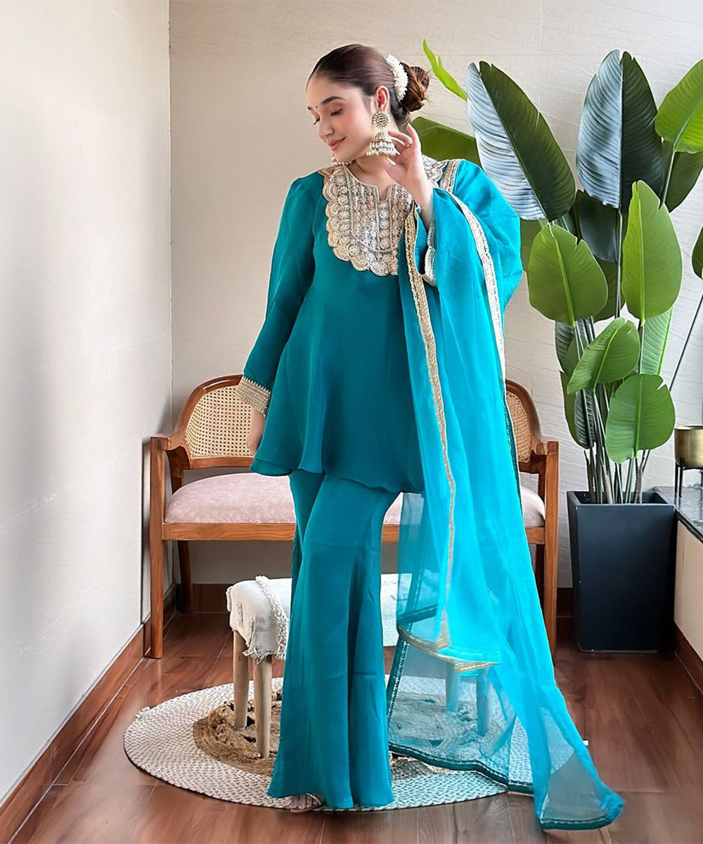 Silk turquoise blue Peplum suit