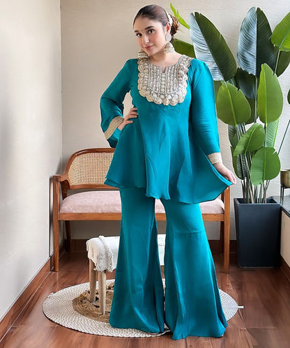 Silk turquoise blue Peplum suit